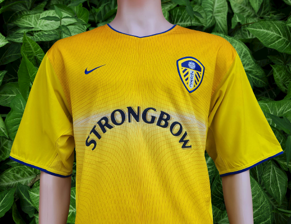 Leeds united deals yellow strongbow shirt