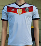 GERMANY 2014 WORLD CUP CHAMPION 4TH TITLE IN BRAZIL HOME JERSEY ADIDAS SHIRT TRIKOT MEMORABILIA COLLECTIBLE 13-14 YRS OLD YOUTH or WOMEN / CODE # M35023  SOLD OUT!