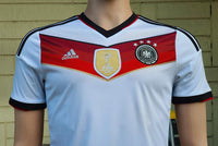 GERMANY 2014 WORLD CUP CHAMPION 4TH TITLE IN BRAZIL HOME JERSEY ADIDAS SHIRT TRIKOT MEMORABILIA COLLECTIBLE 13-14 YRS OLD YOUTH or WOMEN / CODE # M35023  SOLD OUT!